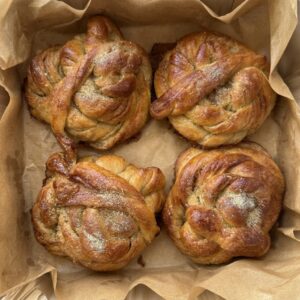 Organic Sano sourdough cardamom buns in a kraft box