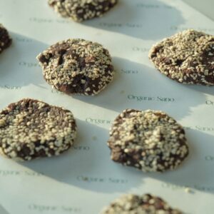Organic Sano tahini chocolate cookies with sesame on branded paper